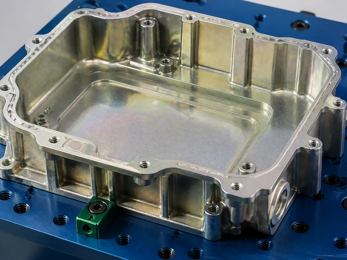Chromate conversion coated aluminum die casting with conductive masking